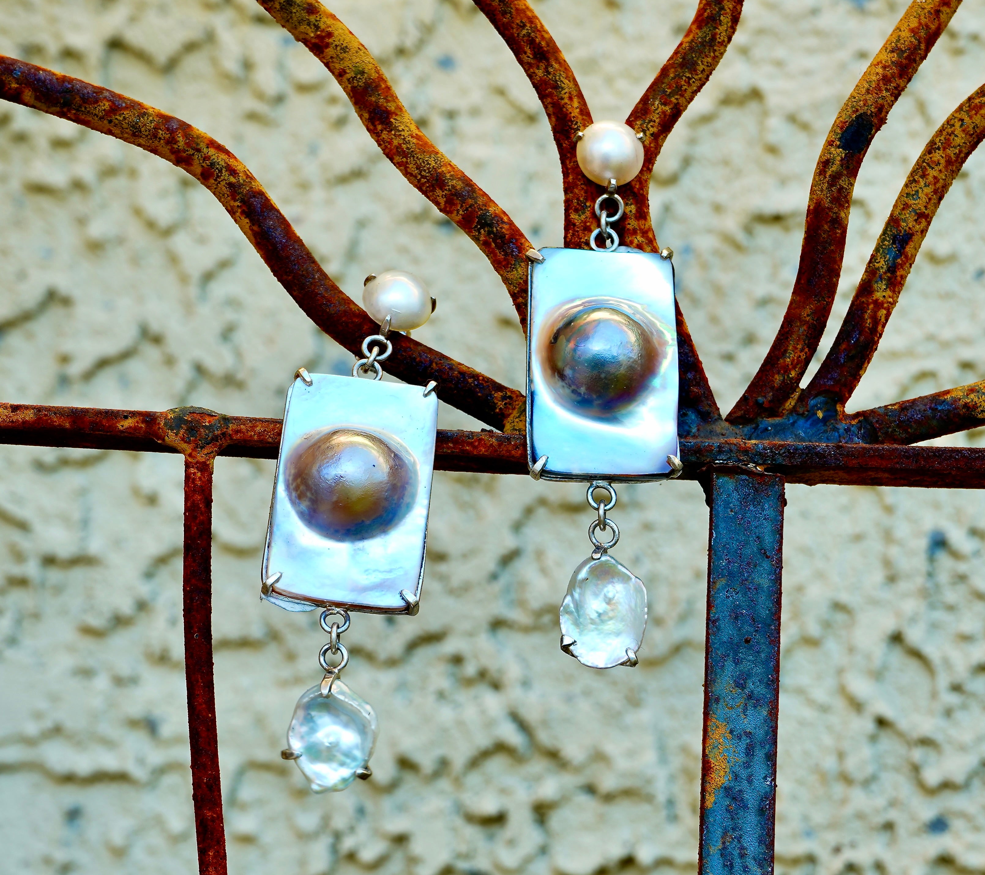 Dangling Exotic Pearl Earrings with Layered Elegance